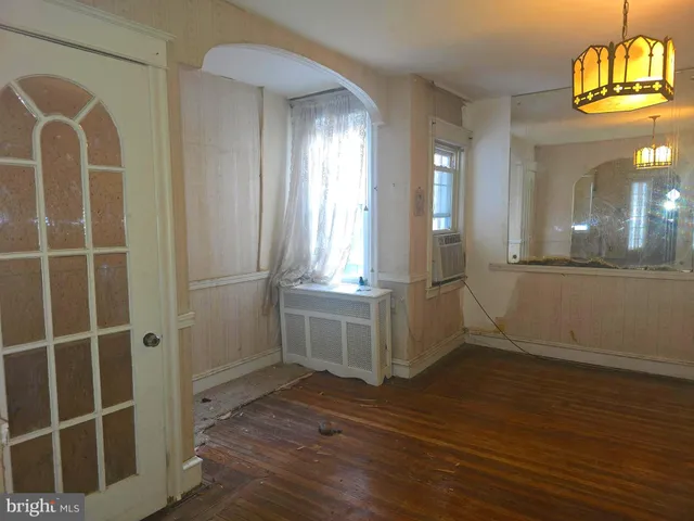 a view of a room with painted walls