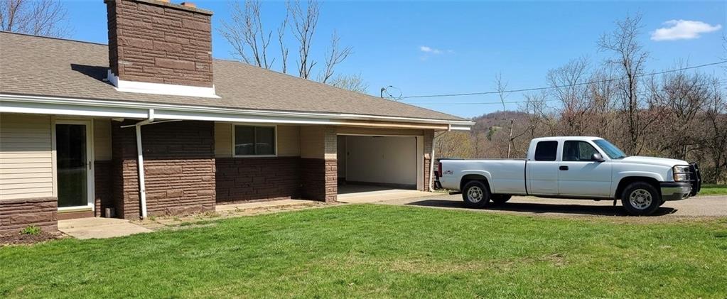 4691 Sardis Road New Kensington, PA 15068 - Photo 2 of 13 a house view with a garden space