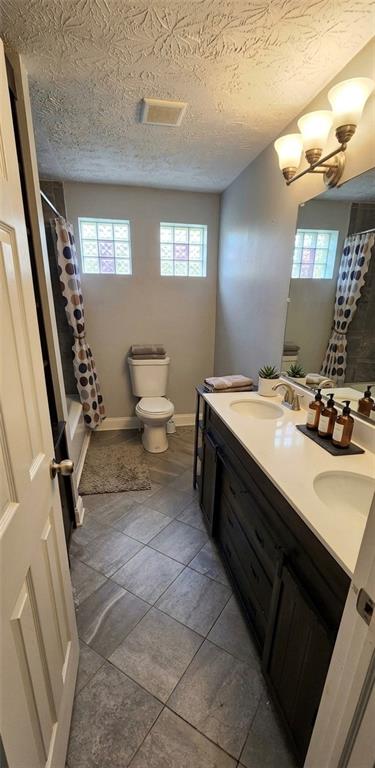 4691 Sardis Road New Kensington, PA 15068 - Photo 8 of 13 a spacious bathroom with a sink a toilet and a mirror