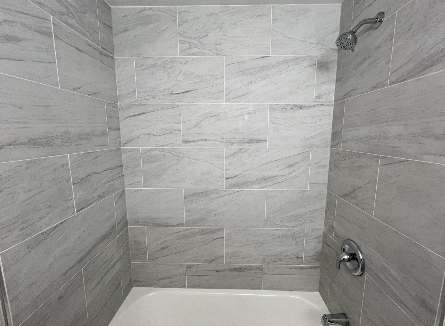 1515 Maple Avenue, Unit 1 Berwyn, IL 60402 - Photo 11 of 12 a bathroom with a shower
