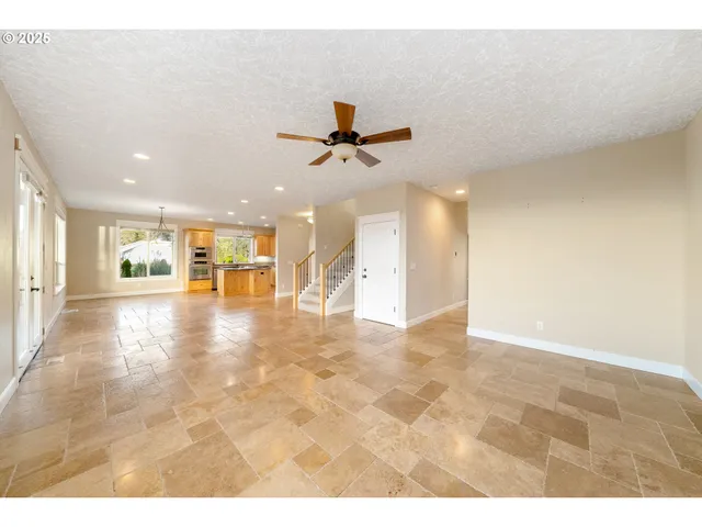 a view of a kitchen with a refrigerator