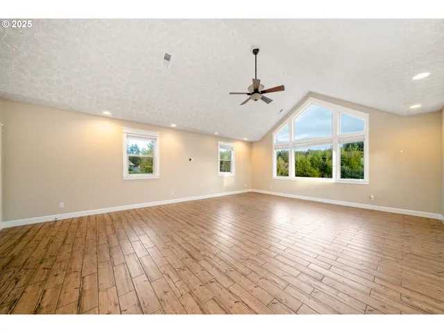 a bathroom with a toilet a sink and a shower