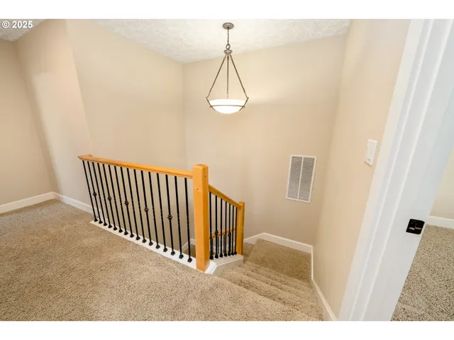 a view of a kitchen with washer and dryer