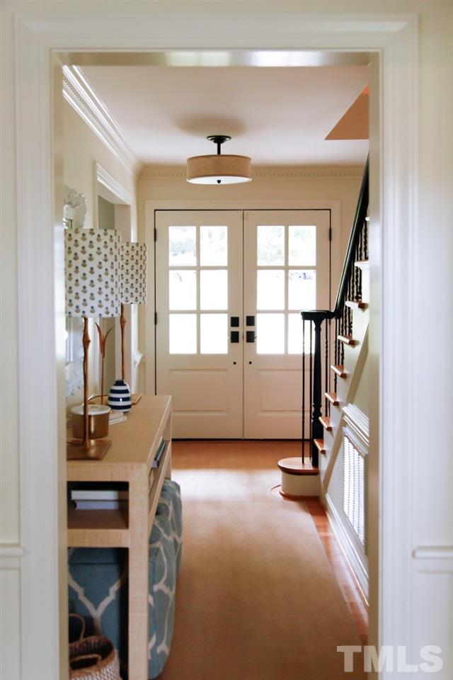 7828 Hardwick Drive Raleigh, NC 27615 - Photo 3 of 25 a view of a workspace with furniture and a window
