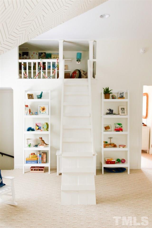 7828 Hardwick Drive Raleigh, NC 27615 - Photo 22 of 25 a room with toys and storage