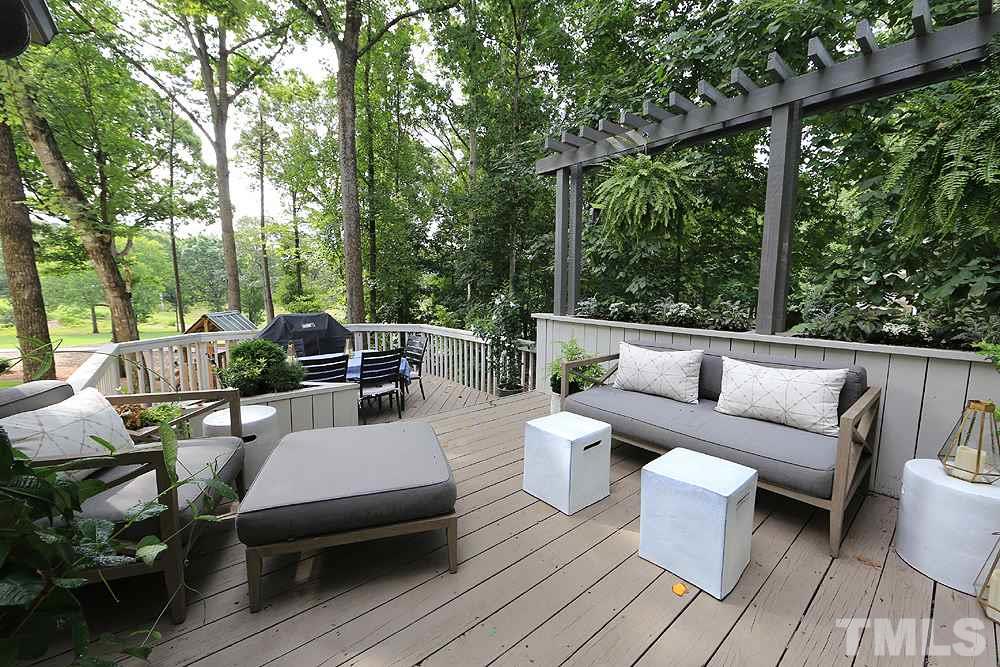 7828 Hardwick Drive Raleigh, NC 27615 - Photo 23 of 25 a view of a patio on the deck