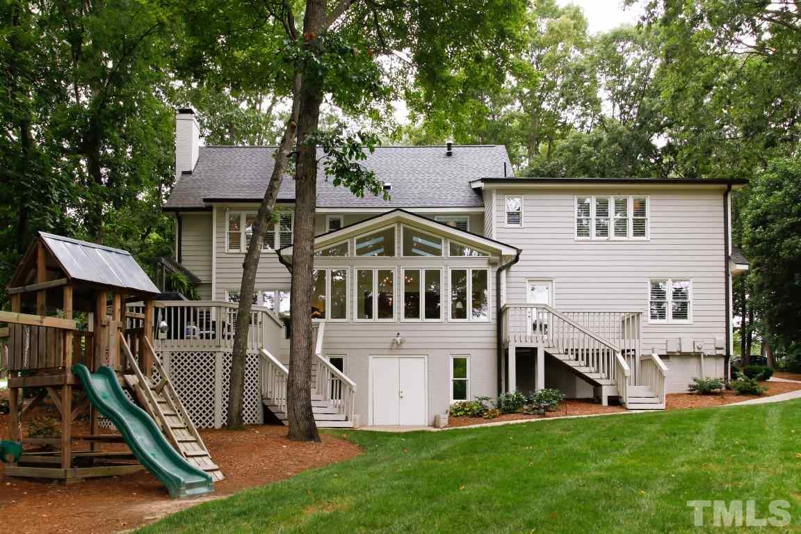 7828 Hardwick Drive Raleigh, NC 27615 - Photo 25 of 25 a front view of a house with a yard