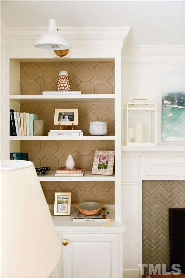 7828 Hardwick Drive Raleigh, NC 27615 - Photo 6 of 25 a shelf with cup and plates