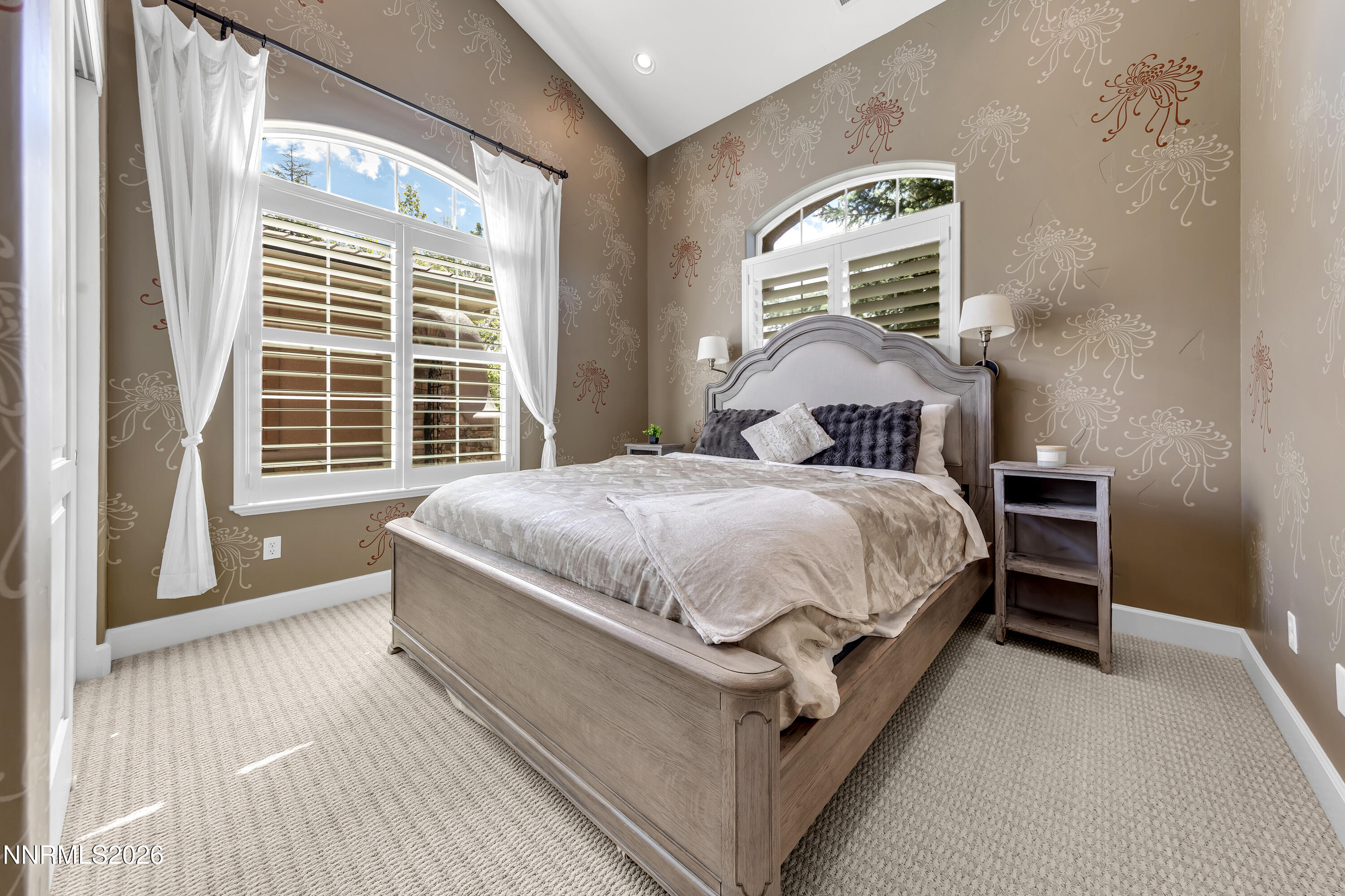 1898 Laurel Ridge Drive Reno, NV 89523 - Photo 47 of 87 a large bed sitting in a bedroom next to a window