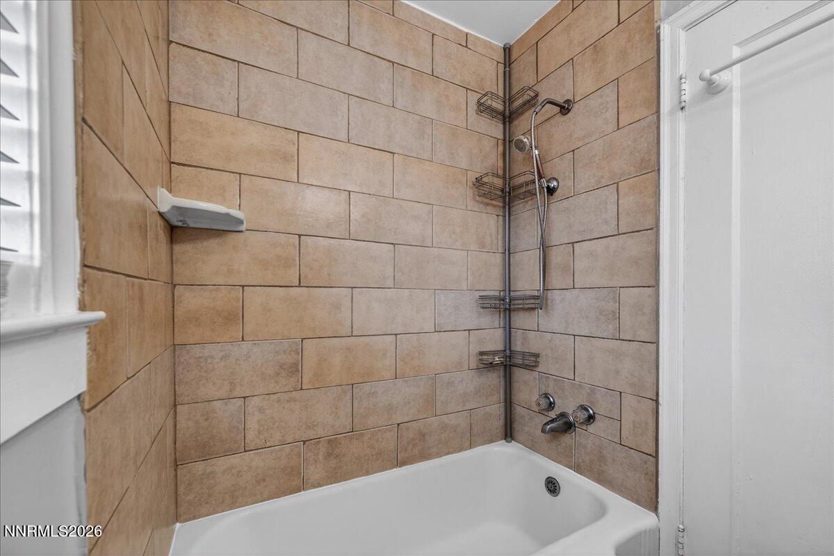 1339 Locust Street Reno, NV 89502 - Photo 17 of 23 a bathroom with a bathtub
