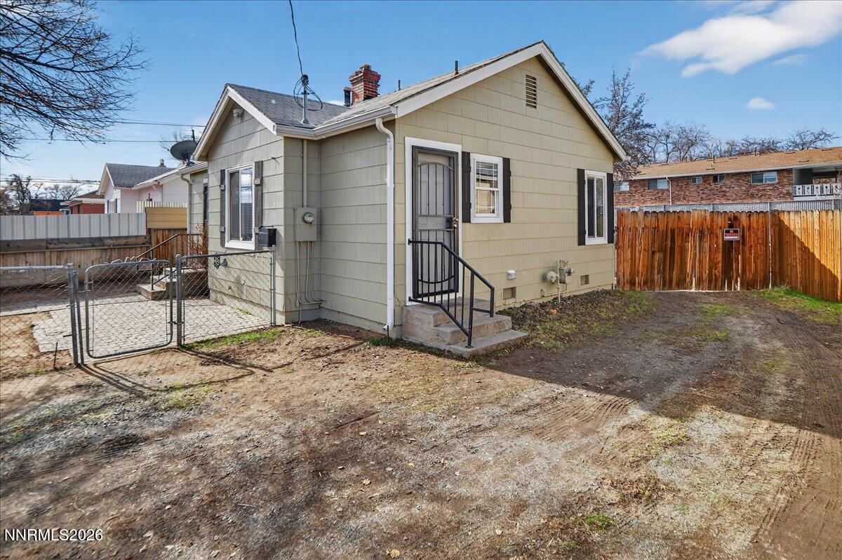 1339 Locust Street Reno, NV 89502 - Photo 2 of 23 a view of a house with wooden fence