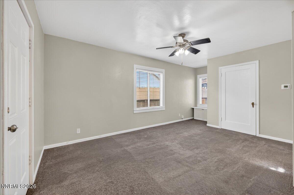 1339 Locust Street Reno, NV 89502 - Photo 6 of 23 a view of an empty room with a ceiling fan
