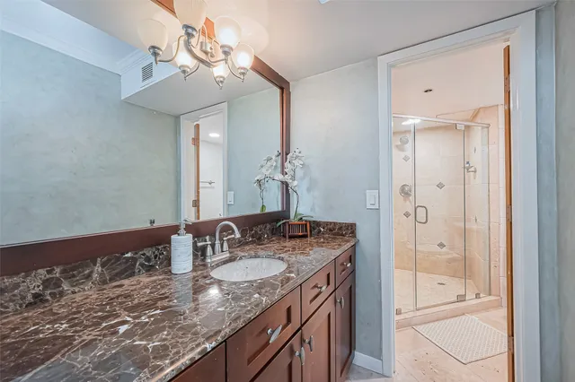 a bathroom with a shower and a toilet