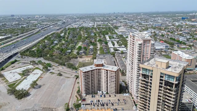 an aerial view of a house with a lake view