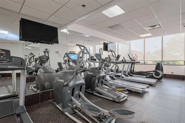 a kitchen with a stove a sink and a refrigerator