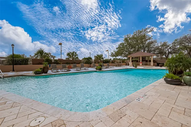 a view of a building with a yard