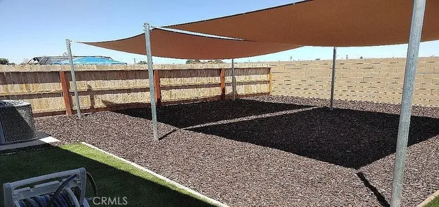 a view of balcony with floor to ceiling window and outdoor space