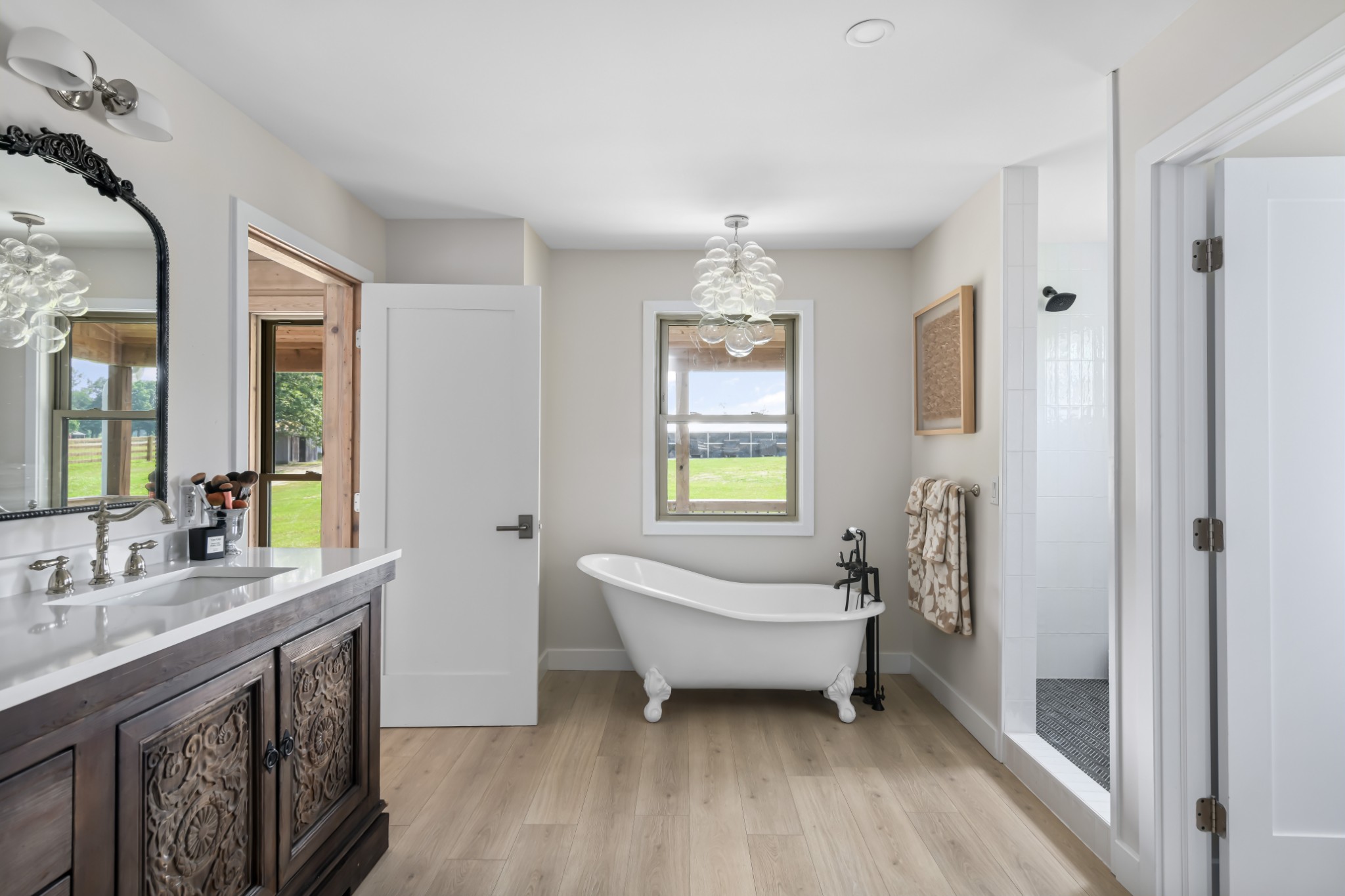 7720 Smith Road Primm Springs, TN 38476 - Photo 23 of 58 a bathroom with a sink a toilet and shower