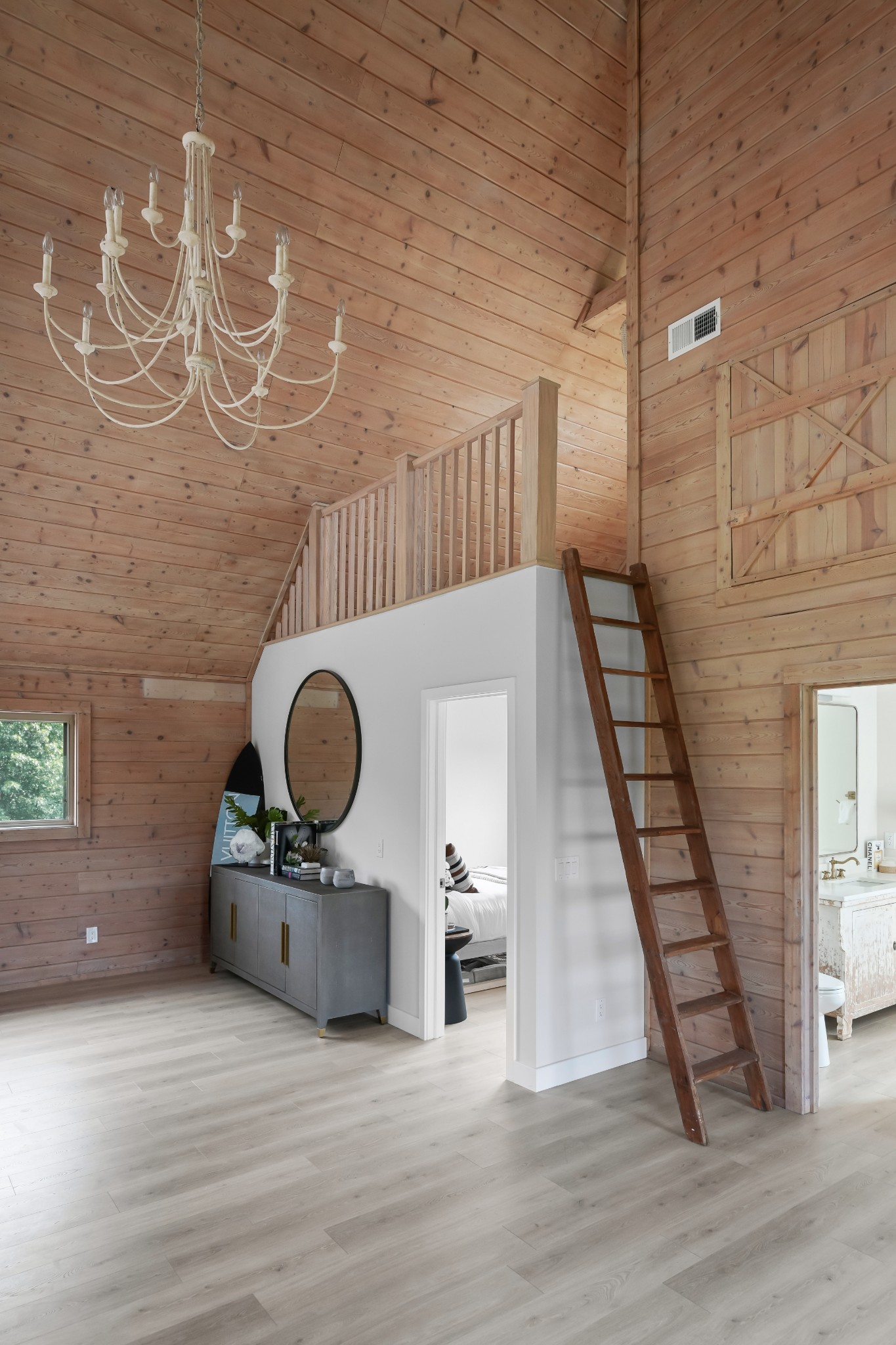 7720 Smith Road Primm Springs, TN 38476 - Photo 28 of 58 a view of a livingroom with wooden floor and staircase