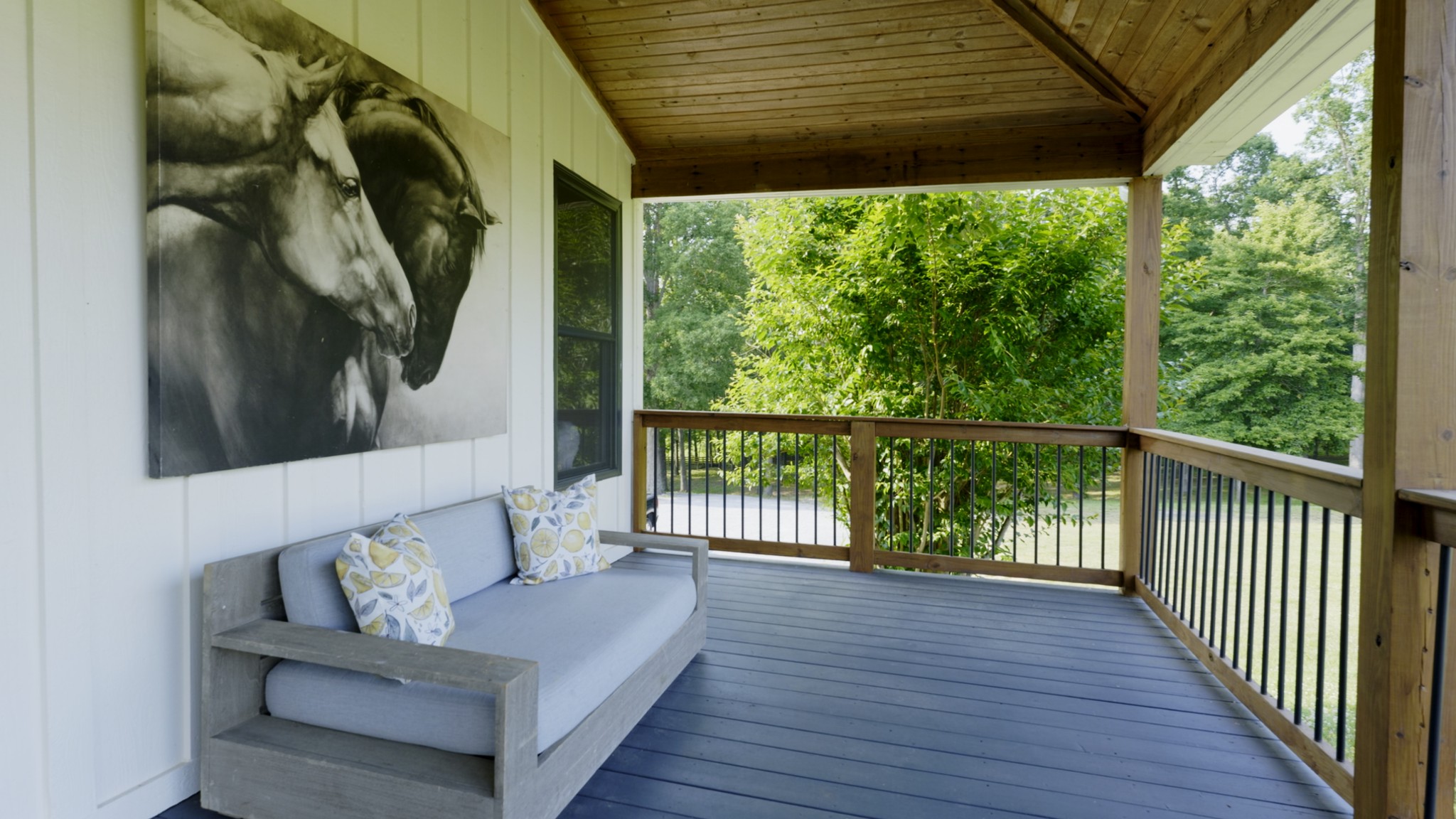 7720 Smith Road Primm Springs, TN 38476 - Photo 36 of 58 a view of a porch with furniture and wooden floor