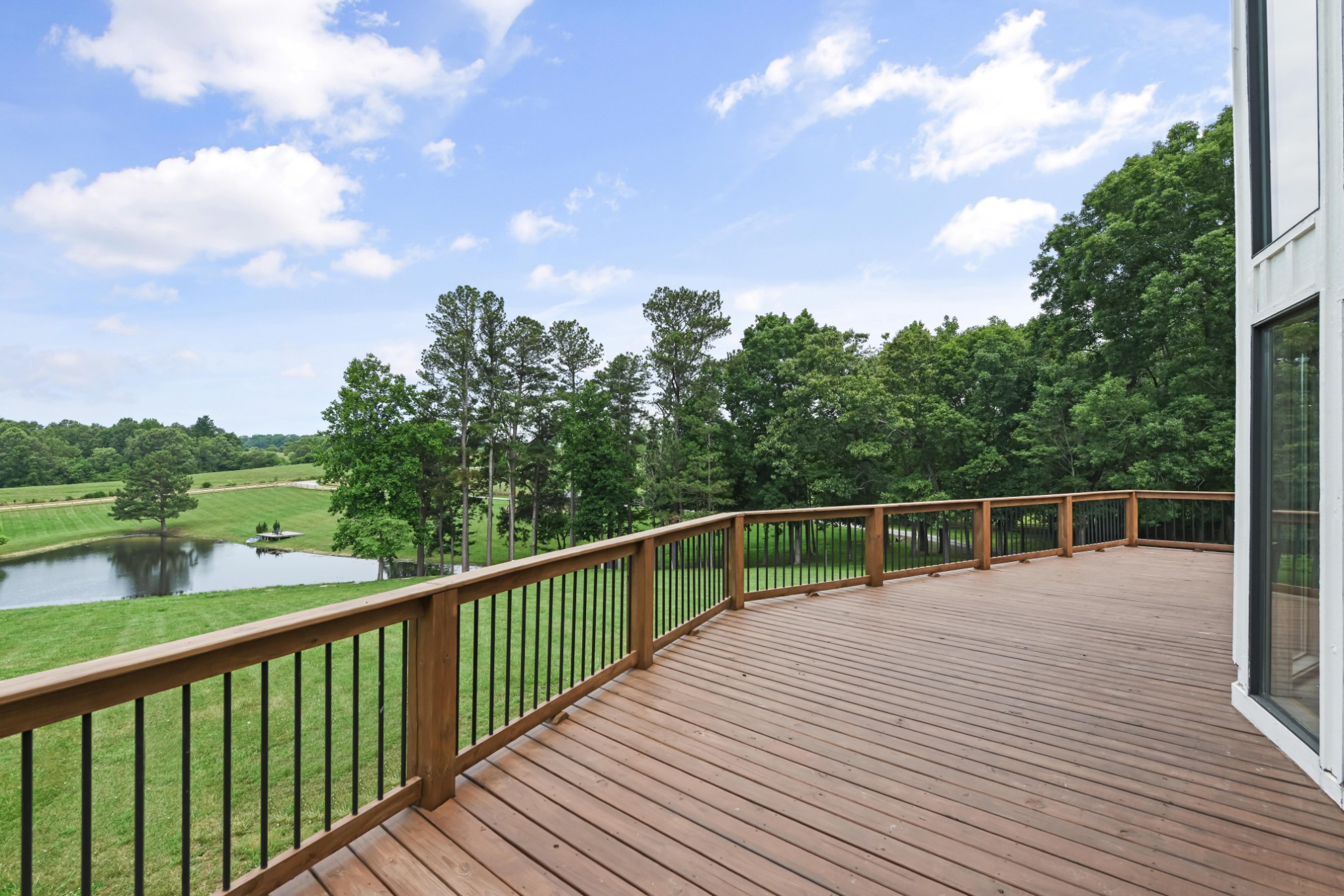 7720 Smith Road Primm Springs, TN 38476 - Photo 38 of 58 a view of balcony with deck and trees