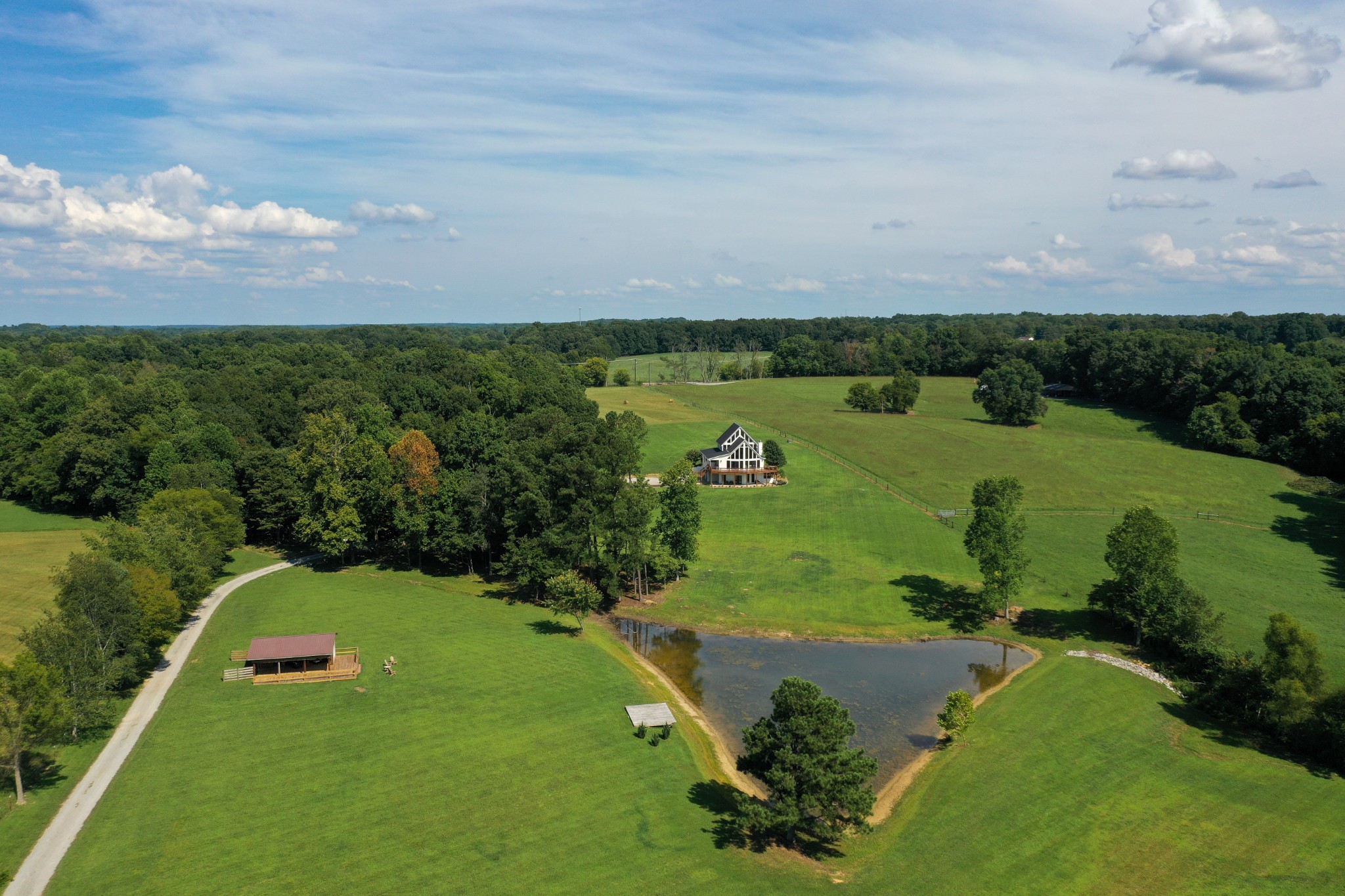 7720 Smith Road Primm Springs, TN 38476 - Photo 45 of 58 a view of a lake with a city