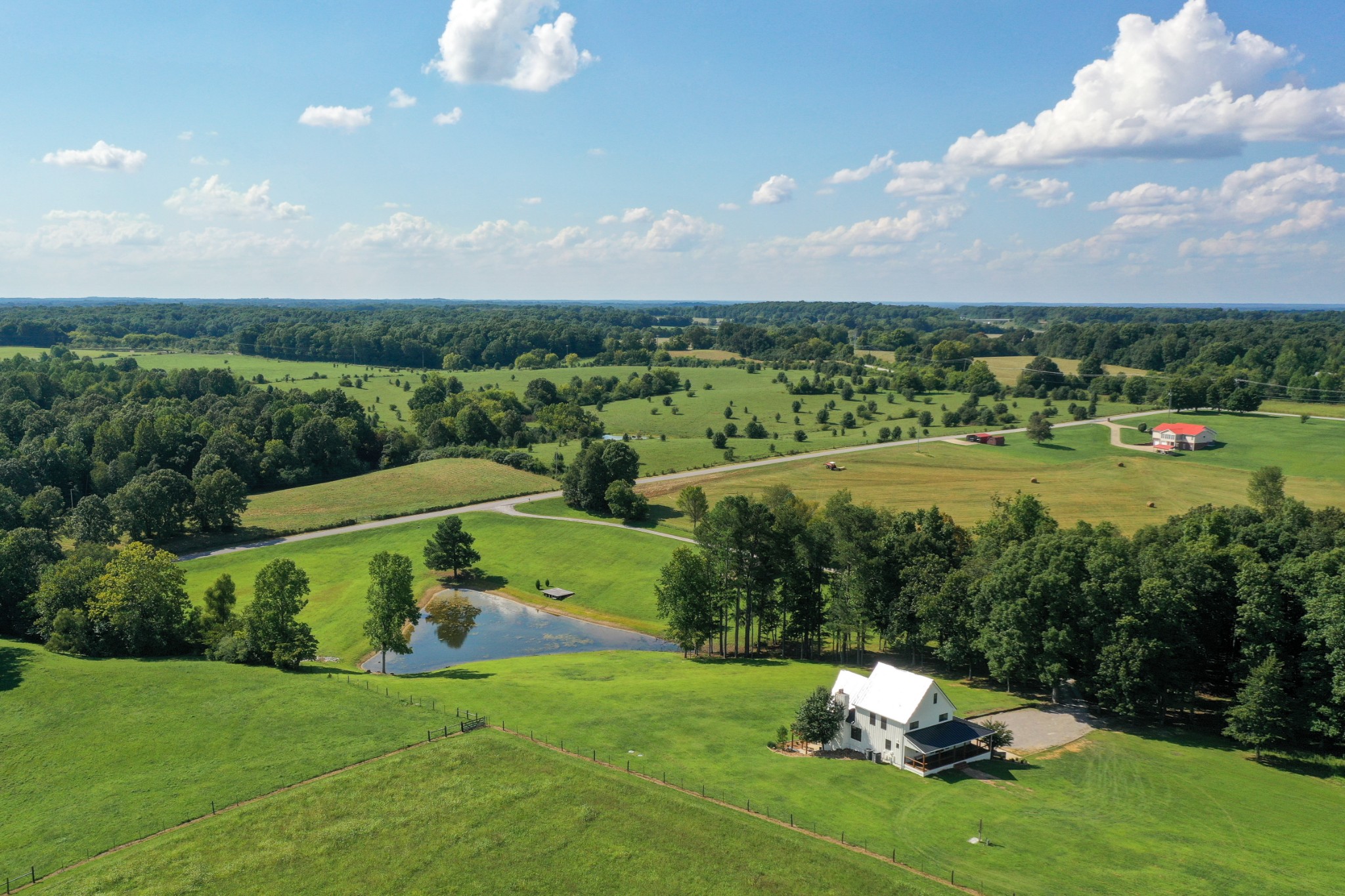 7720 Smith Road Primm Springs, TN 38476 - Photo 48 of 58 a view of a golf course with a lake