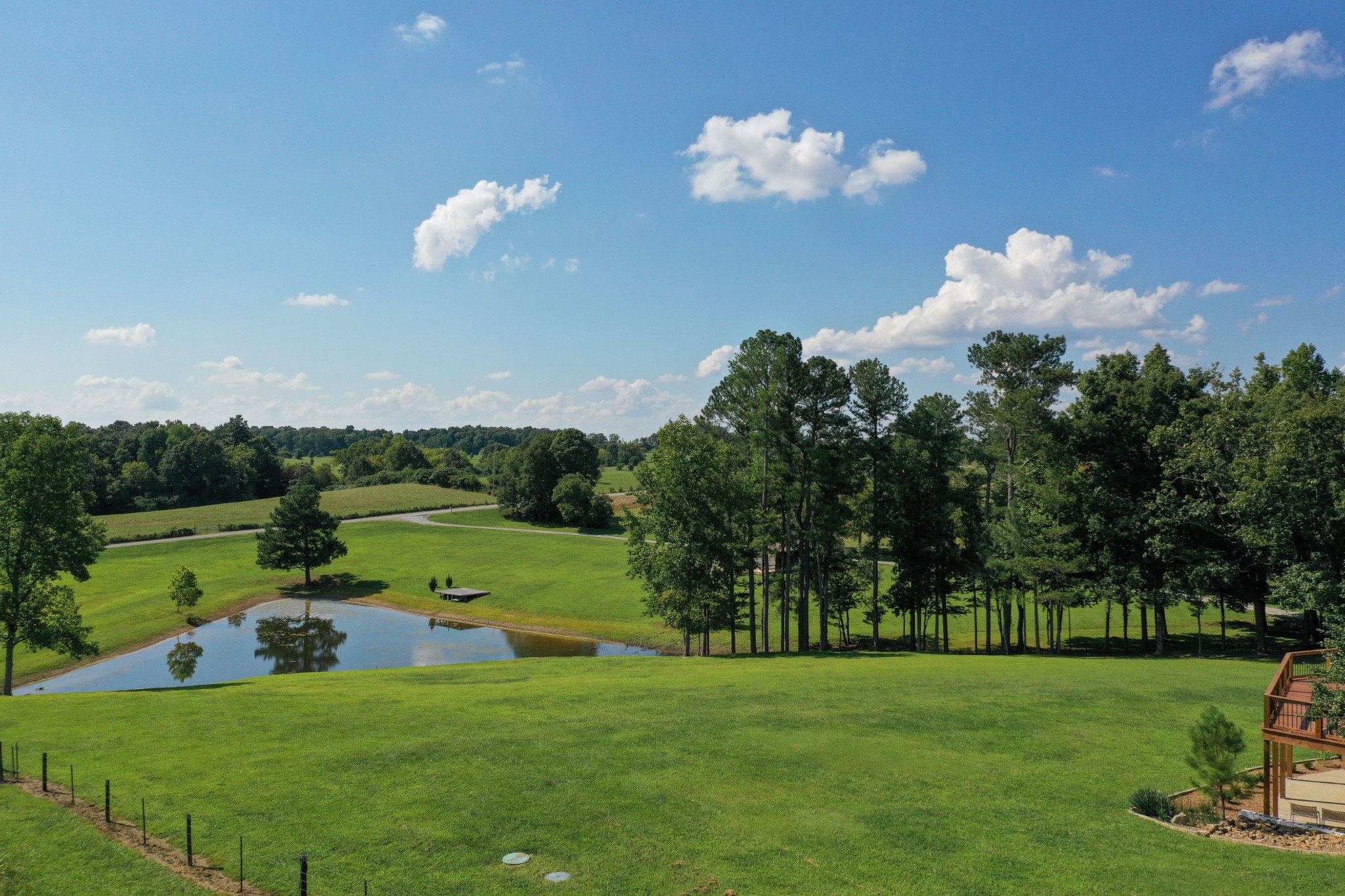 7720 Smith Road Primm Springs, TN 38476 - Photo 49 of 58 a view of a golf course with a lake