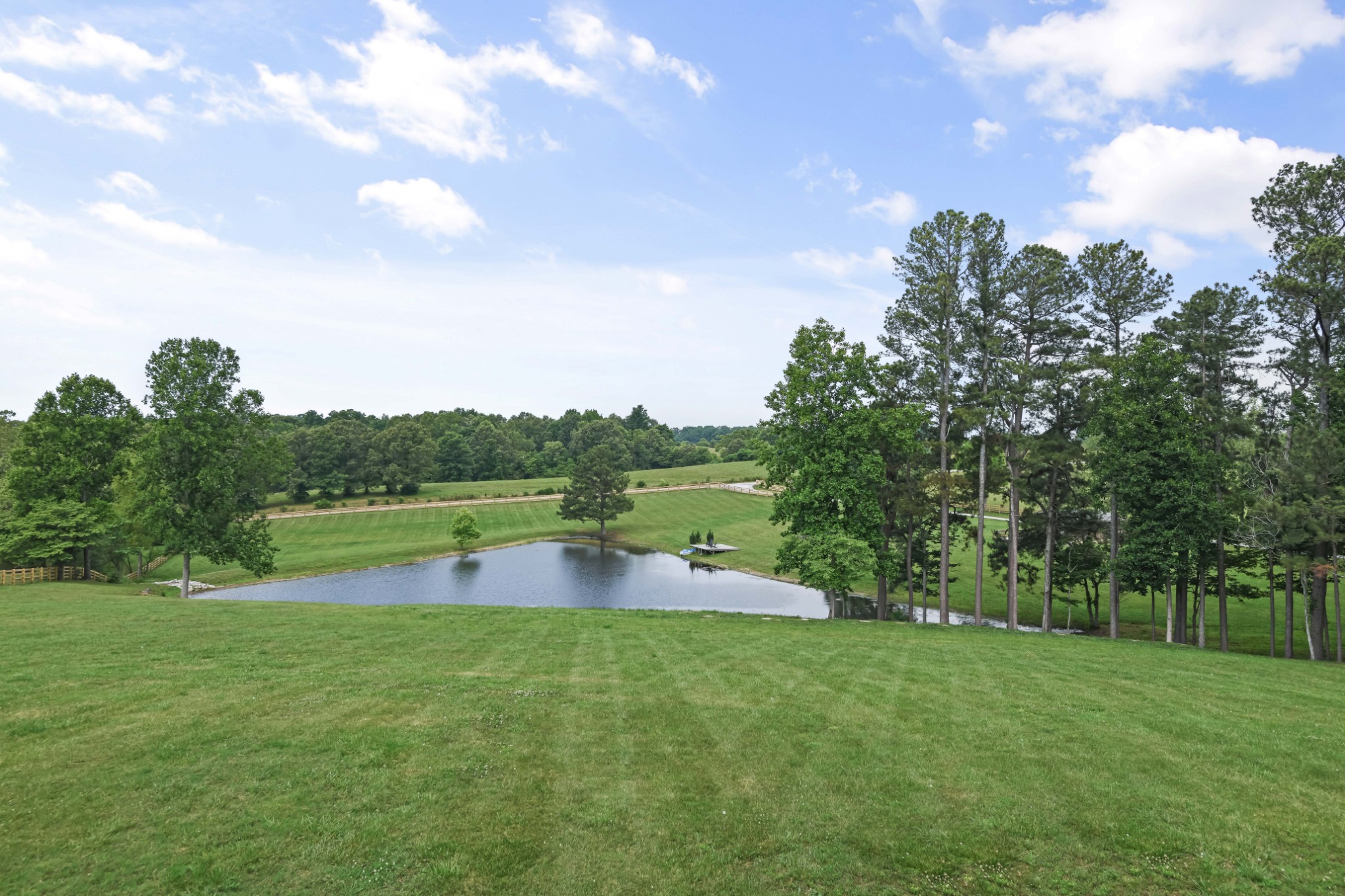 7720 Smith Road Primm Springs, TN 38476 - Photo 50 of 58 a view of a lake with houses in the back