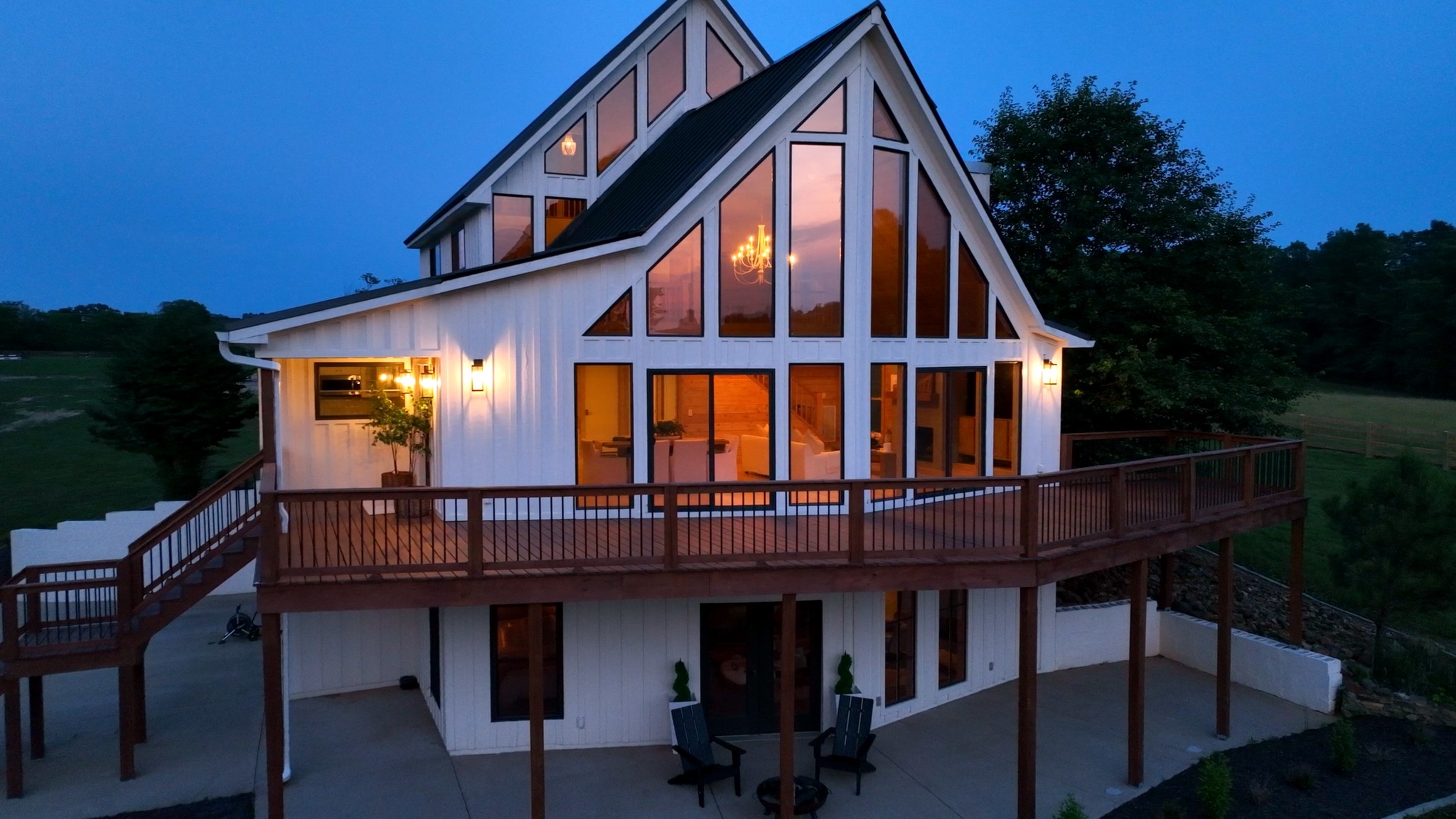 7720 Smith Road Primm Springs, TN 38476 - Photo 55 of 58 a view of house with a deck and furniture