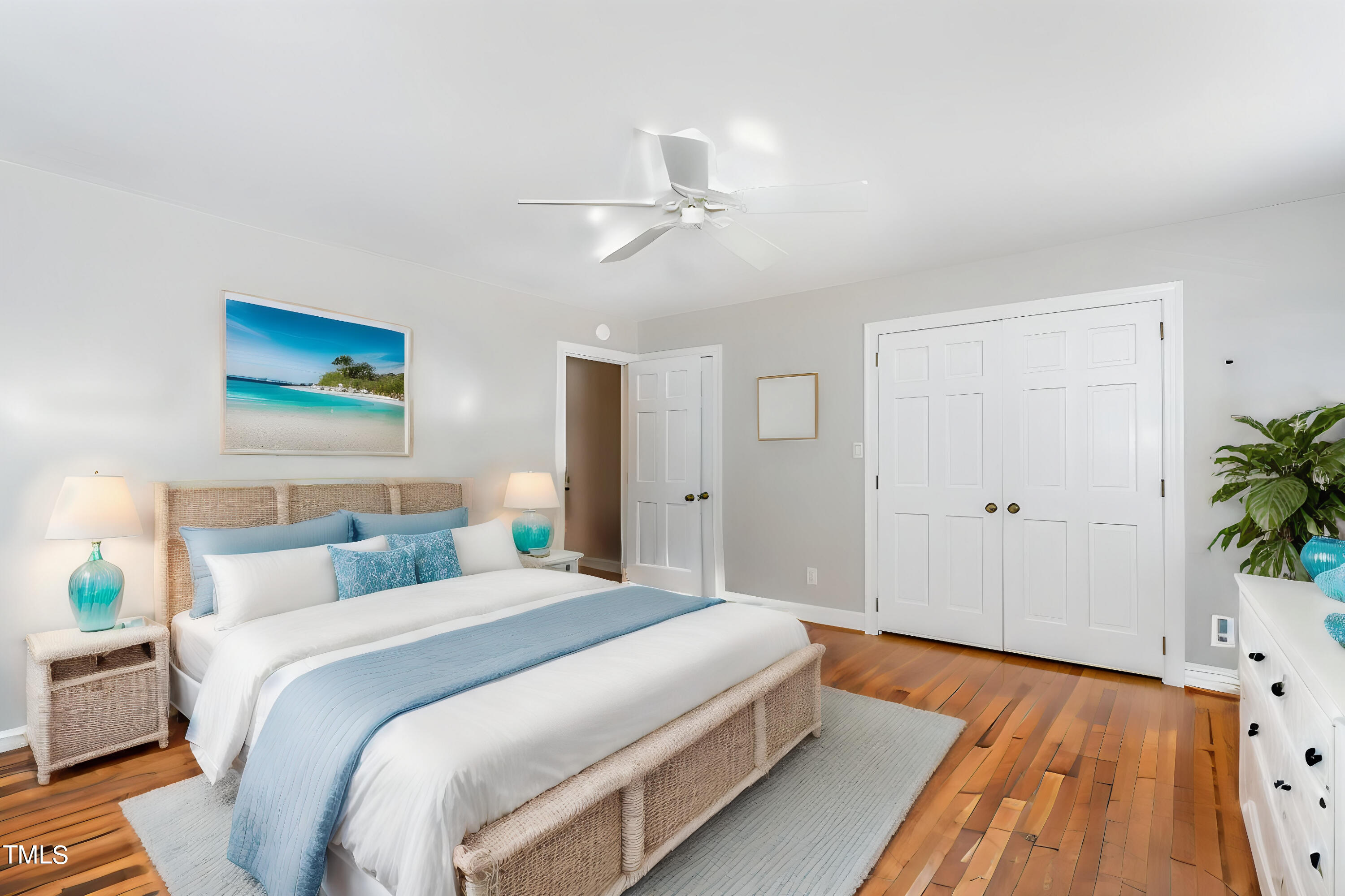 2901 Augusta Court Raleigh, NC 27607 - Photo 17 of 28 a bedroom with bed and wooden floor