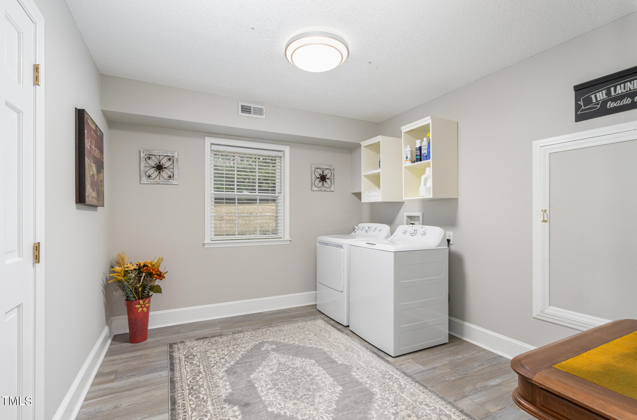 2901 Augusta Court Raleigh, NC 27607 - Photo 19 of 28 a view of utility room with washer and dryer