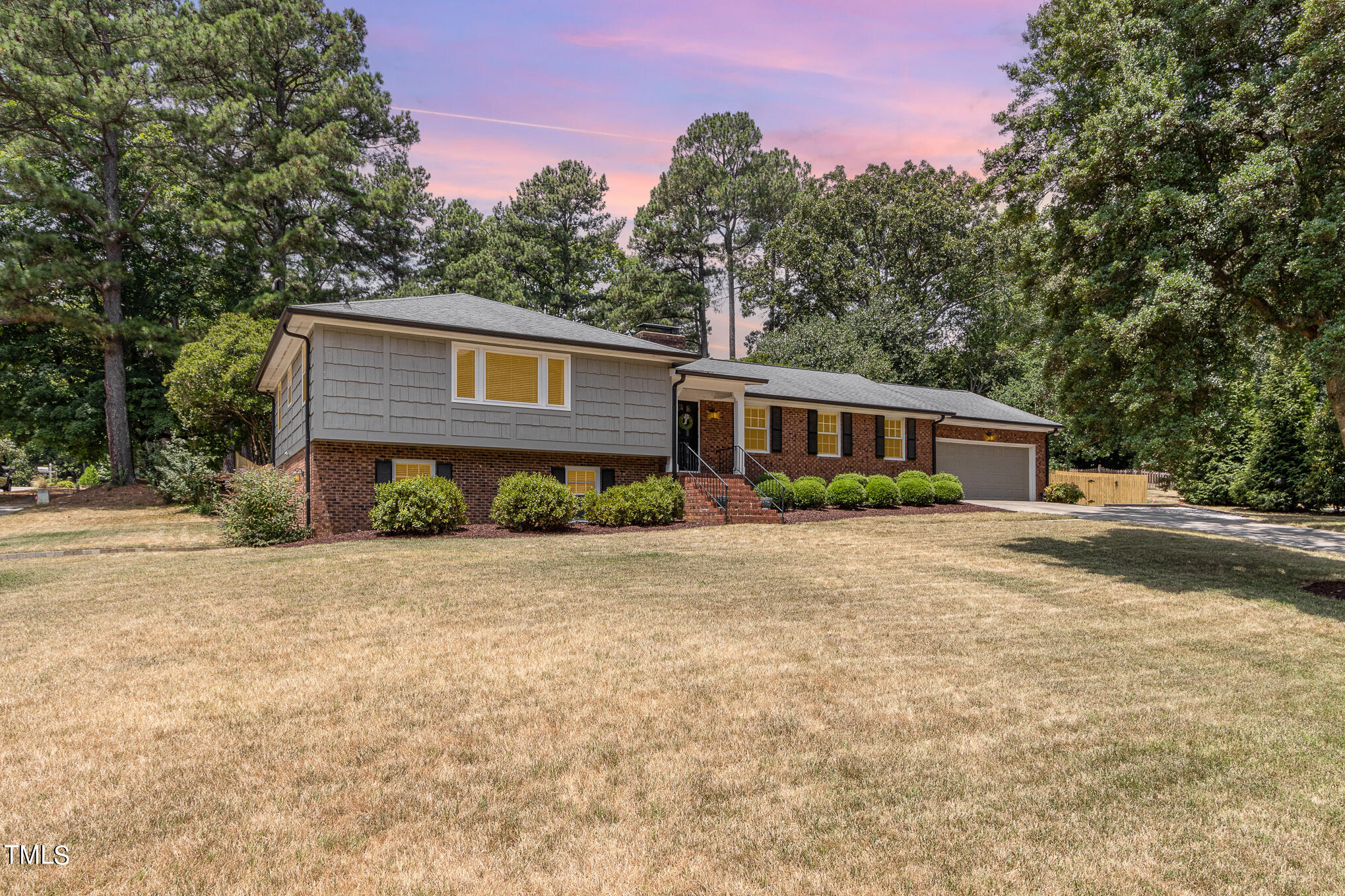 2901 Augusta Court Raleigh, NC 27607 - Photo 2 of 28 front view of a house with a yard
