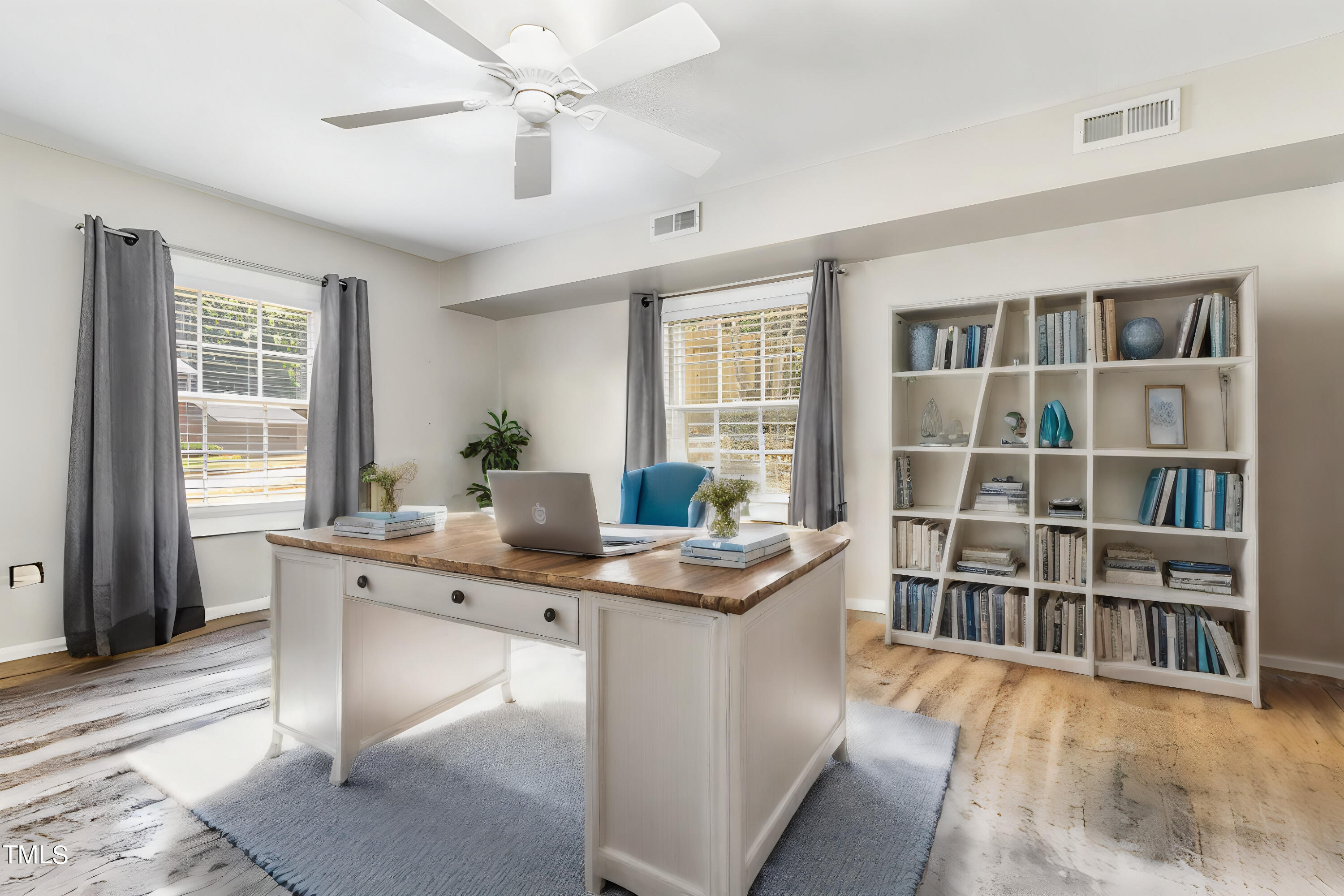 2901 Augusta Court Raleigh, NC 27607 - Photo 21 of 28 a kitchen with stainless steel appliances granite countertop a stove a sink and dishwasher with wooden floor
