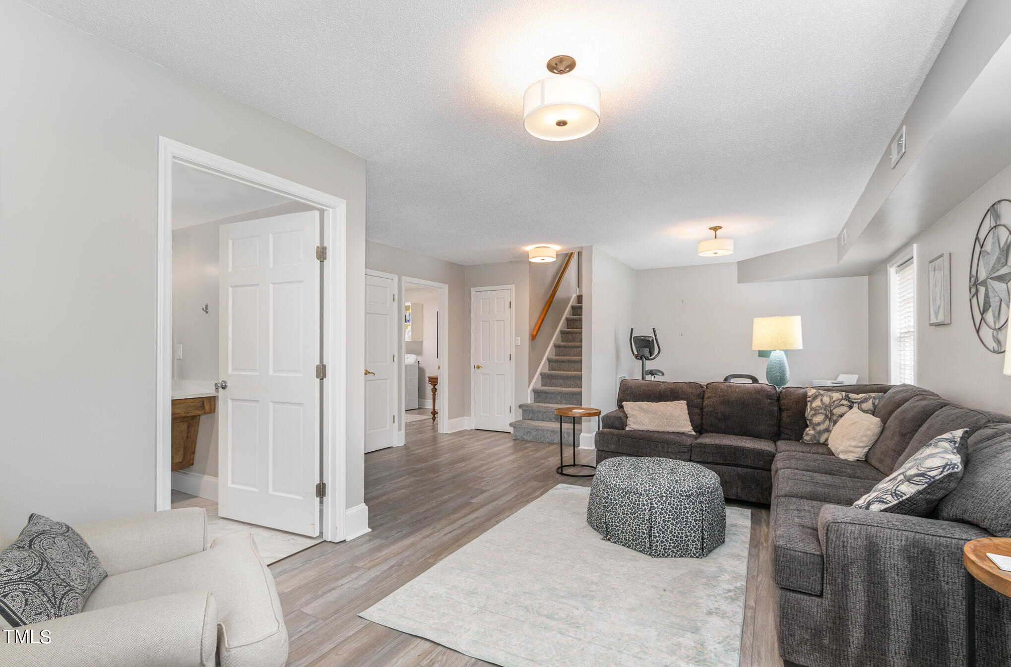 2901 Augusta Court Raleigh, NC 27607 - Photo 23 of 28 a living room with furniture and a couch