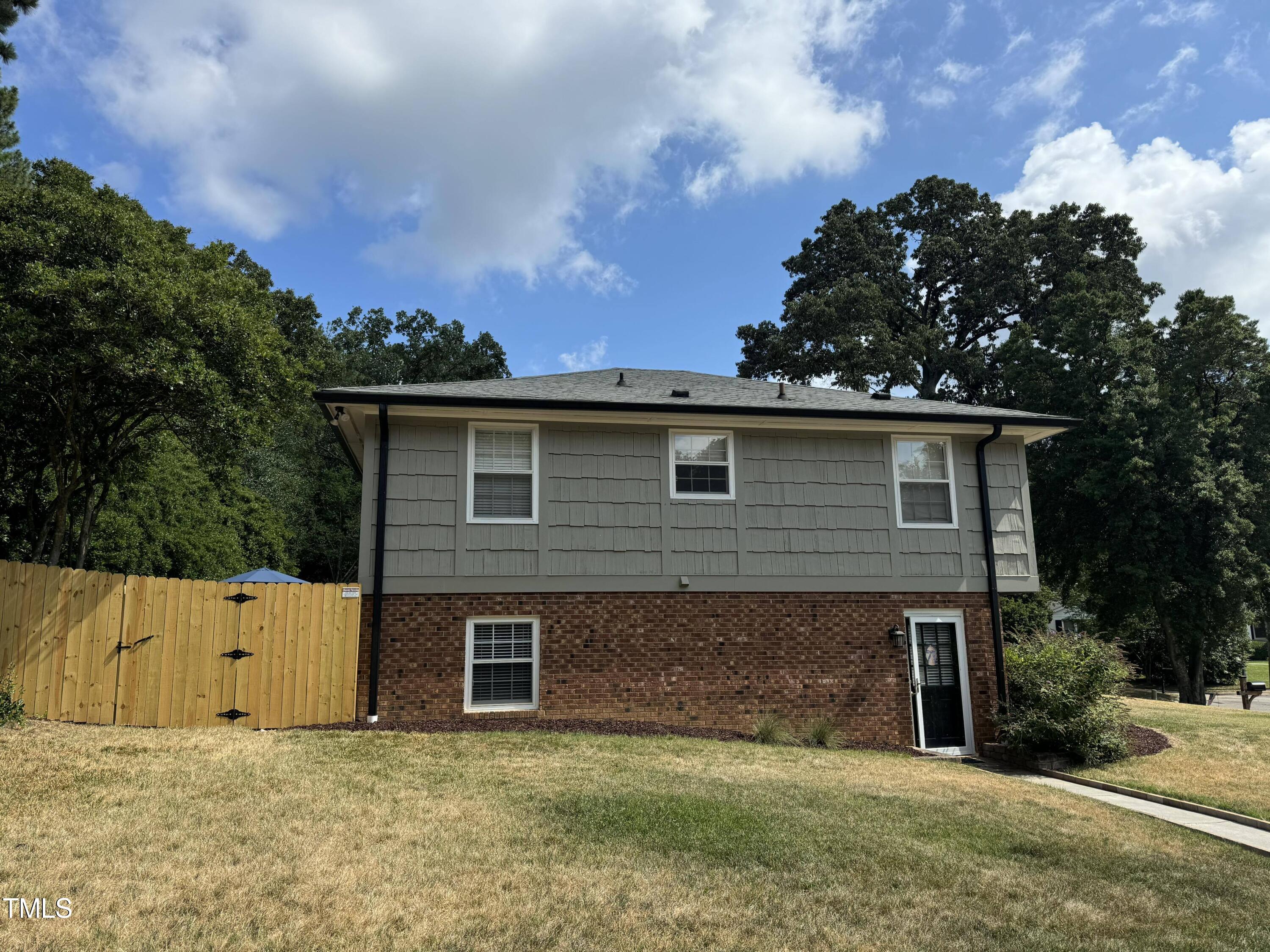 2901 Augusta Court Raleigh, NC 27607 - Photo 28 of 28 a view of a house with a yard