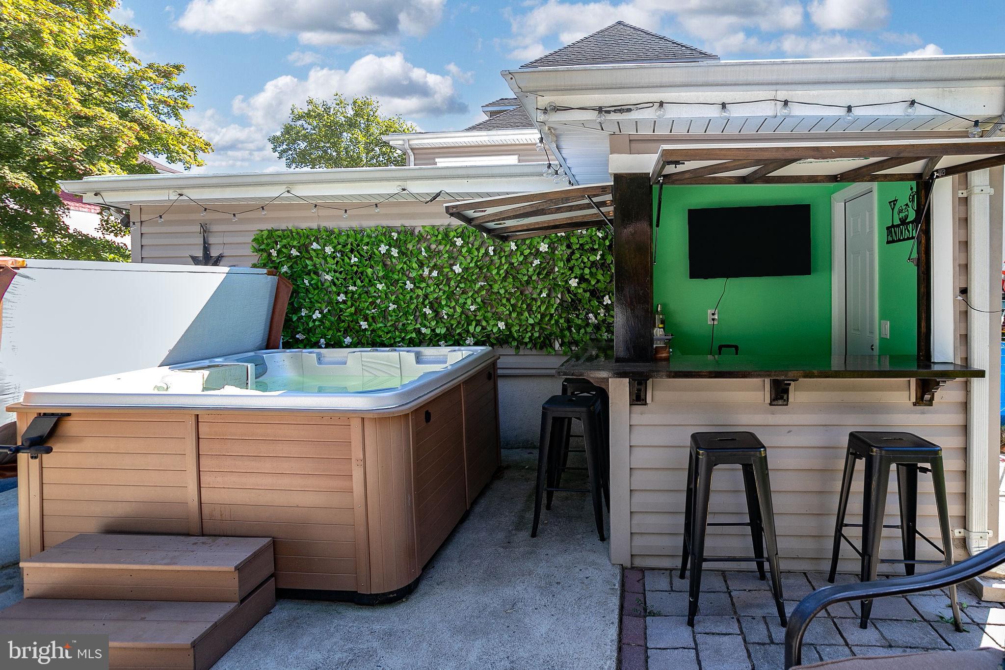 3380 Nottingham Way Hamilton, NJ 08690 - Photo 20 of 25 Backyard - Jacuzzi and Bar Area