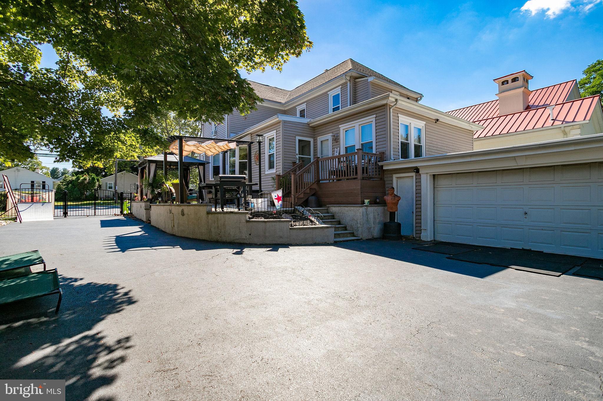 3380 Nottingham Way Hamilton, NJ 08690 - Photo 21 of 25 Backyard Driveway View
