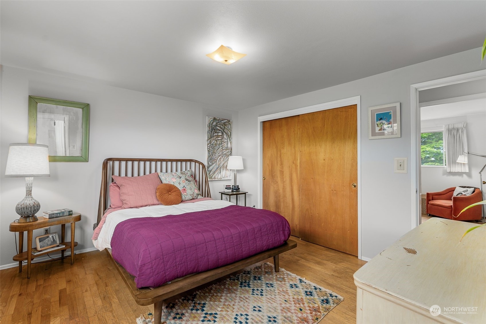 2520 South Raymond Street Seattle, WA 98108 - Photo 15 of 39 a bedroom with a bed and wooden floor