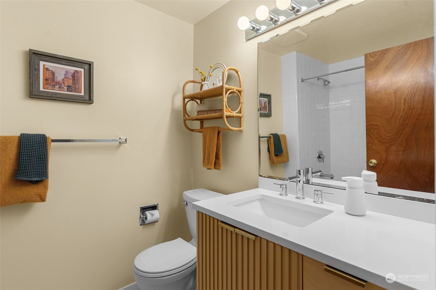 2520 South Raymond Street Seattle, WA 98108 - Photo 20 of 39 a bathroom with a sink vanity mirror and toilet