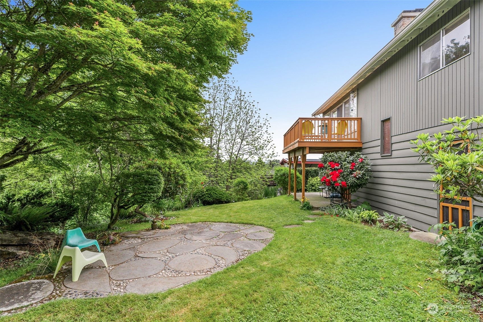 2520 South Raymond Street Seattle, WA 98108 - Photo 32 of 39 a view of a chair and table in backyard of the house
