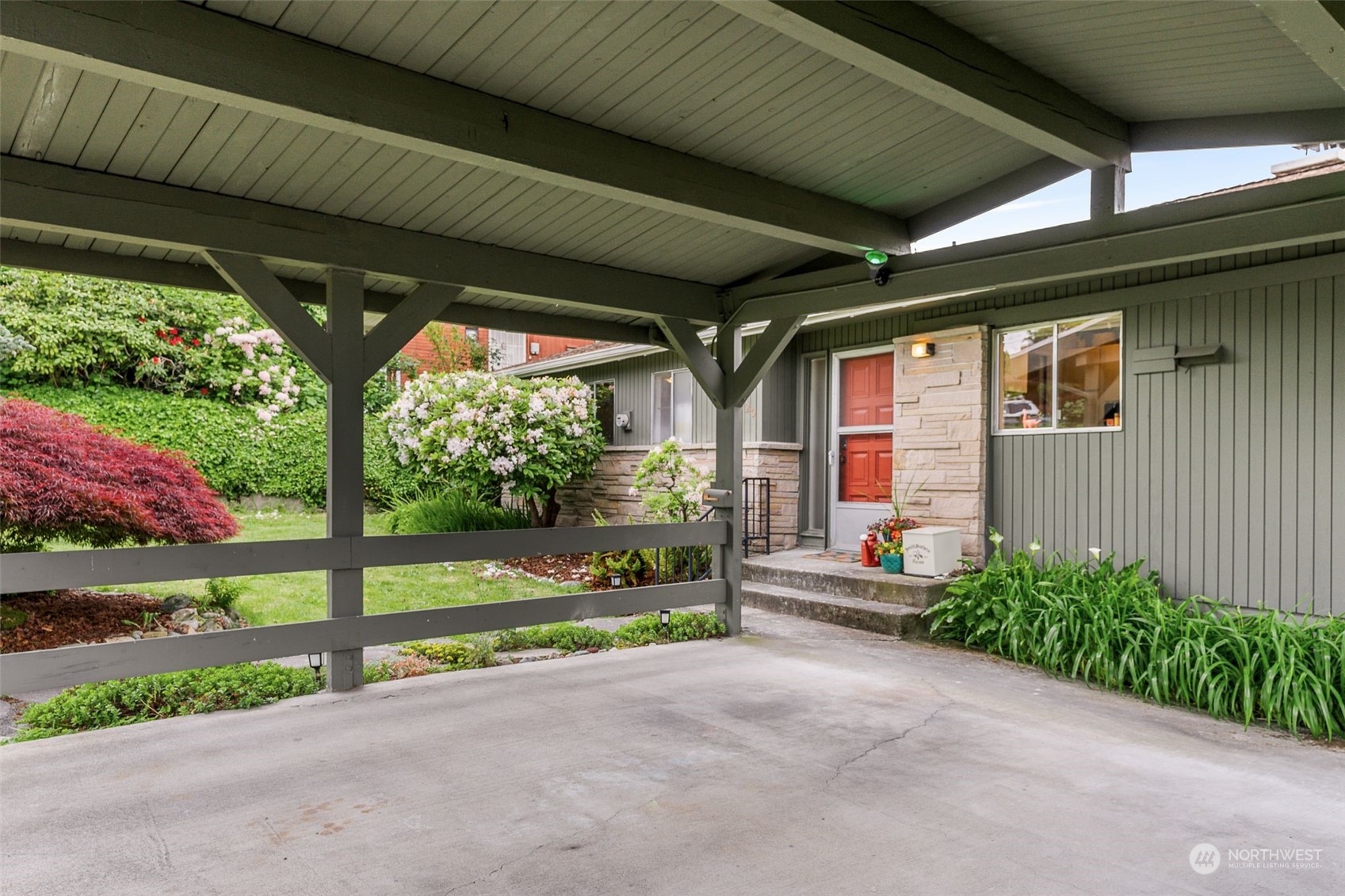 2520 South Raymond Street Seattle, WA 98108 - Photo 37 of 39 a view of porch with a table and chairs under an umbrella