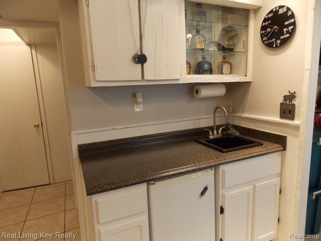 1654 Rochester Road Leonard, MI 48367 - Photo 39 of 45 Wet bar in lower level