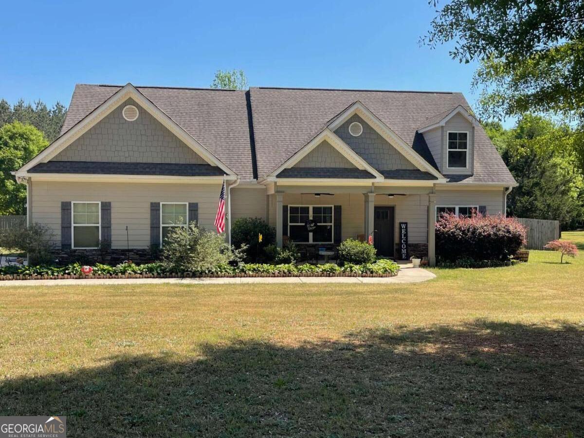457 Old Good Hope Road Good Hope, GA 30641 - Photo 39 of 59 a front view of a house with a yard