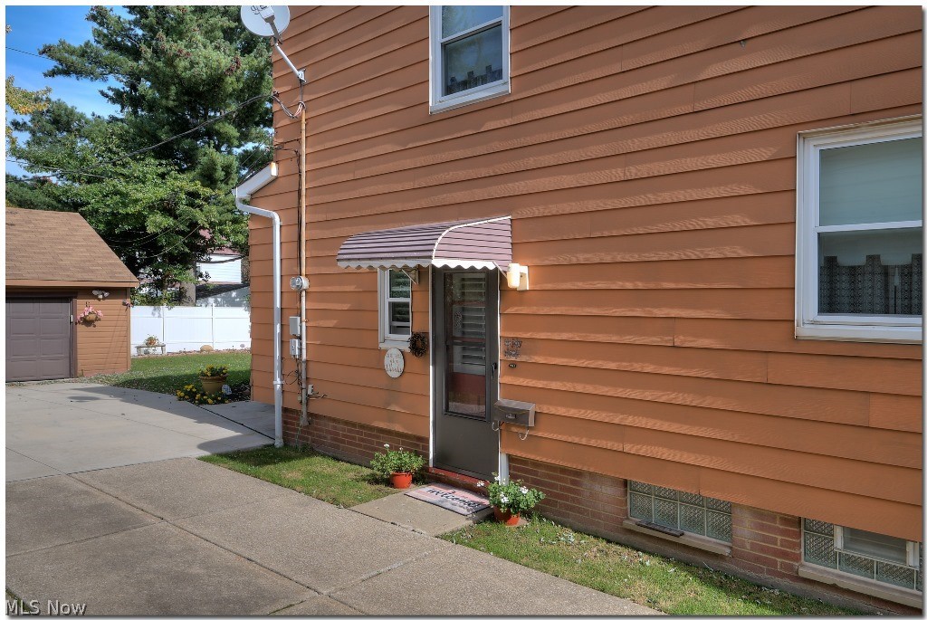 4103 Linnell Road Cleveland, OH 44121 - Photo 25 of 27 Note, the nice white fence for privacy at backyard.
