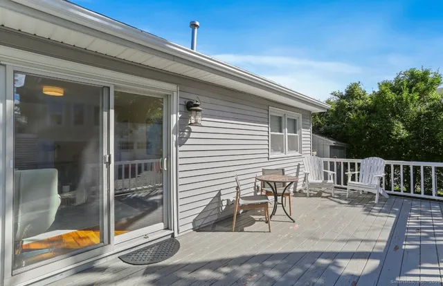 a view of balcony with seating space