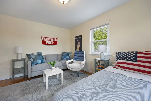 a living room with furniture and windows