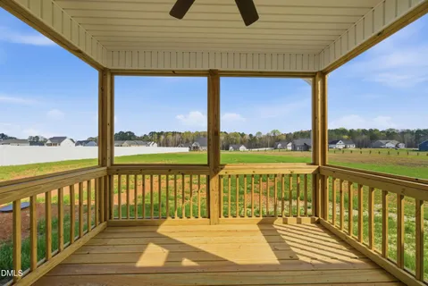 a view of a balcony with wooden floor