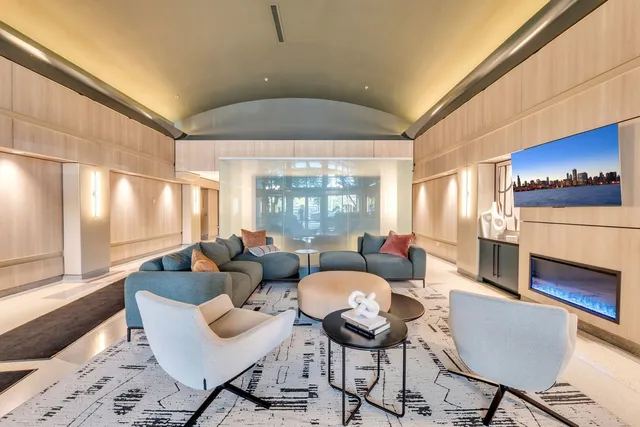 a kitchen with a table chairs stove and cabinets