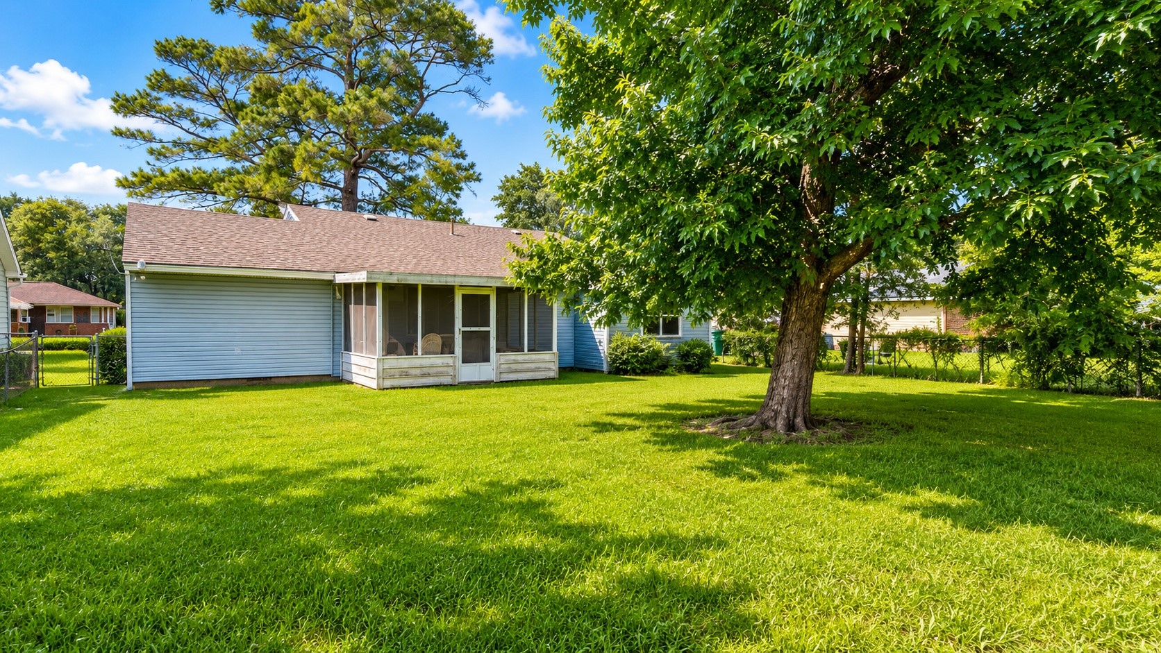 5130 Cortelyou Lane Houston, TX 77021 - Photo 12 of 13 Expansive backyard featuring mature shade trees, a spacious lawn, and plenty of room for outdoor activities and entertaining.